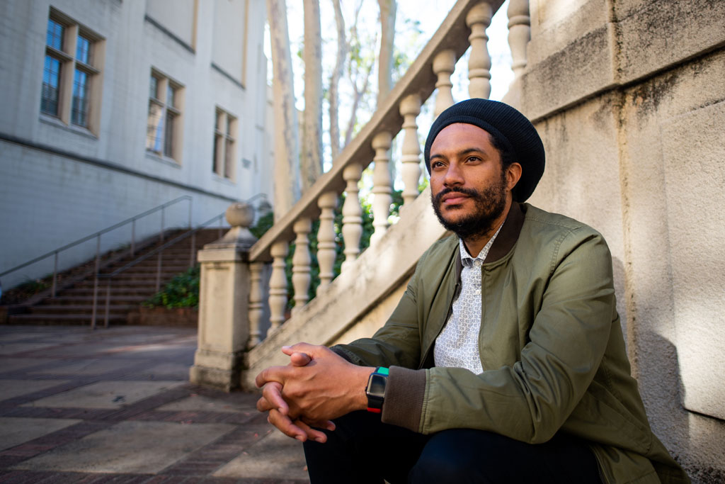 Environmental portrait of Jovan Scott Lewis. Credit: Beth LaBerge, KQED