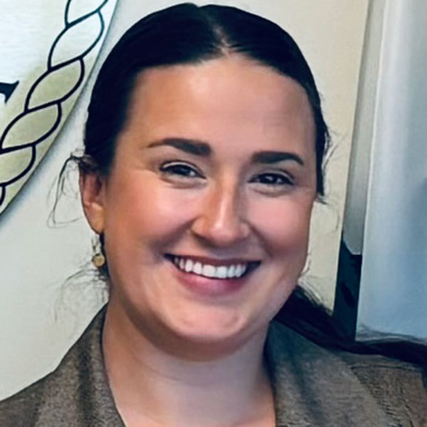 Headshot of Julia Rose Dowell taken during a conference